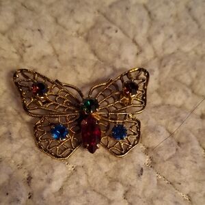 Elegant Gold Butterfly Brooch with Multicolor Gems